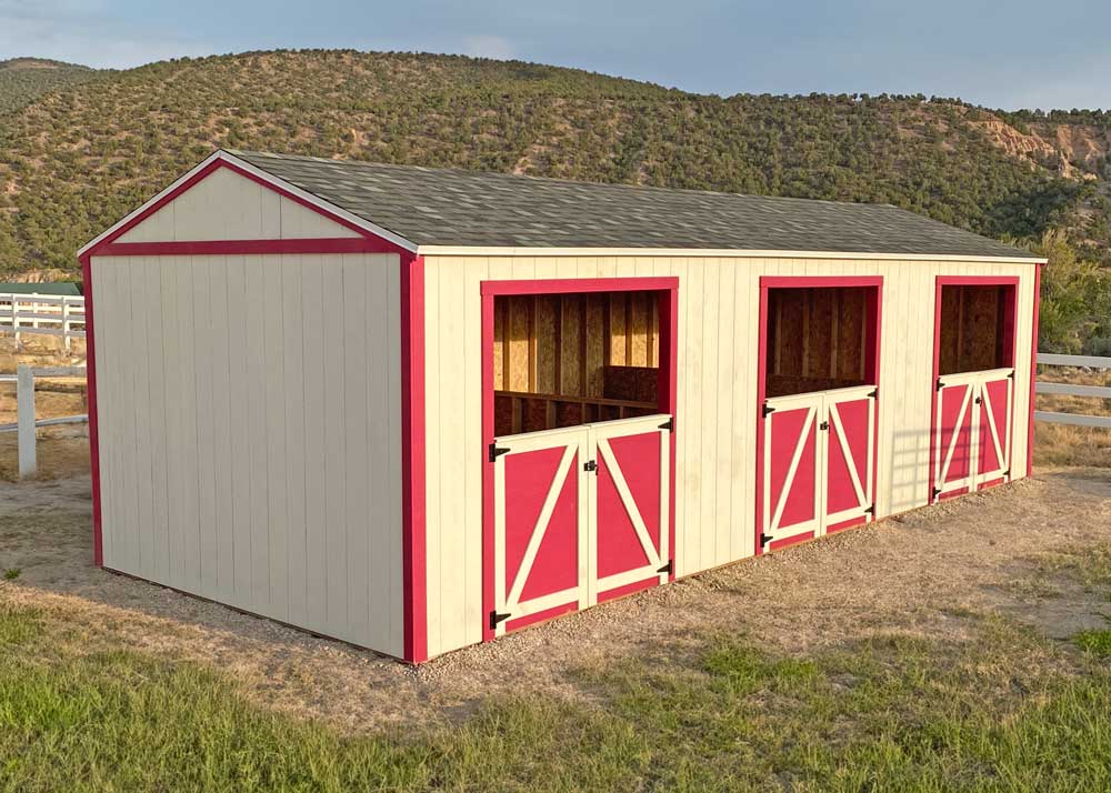 A custom Tall Apex loafing shed with custom gates