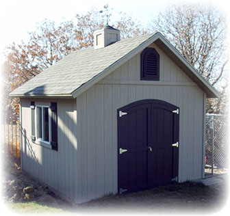 Apex custom shed with arch top carriage house doors