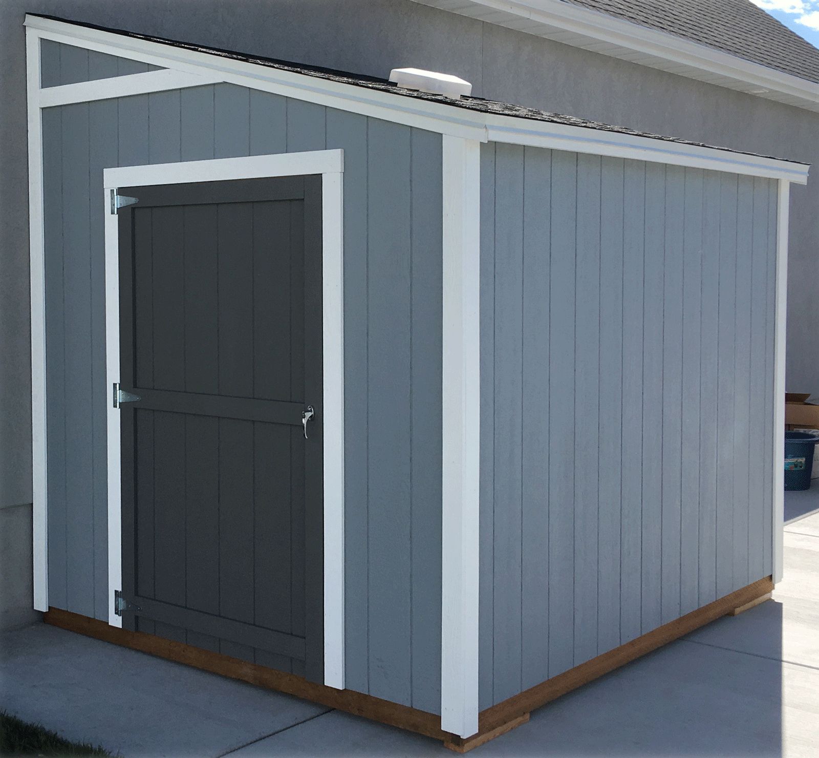 An 8 foot by 10 foot Lean-To Style Shed up against a house